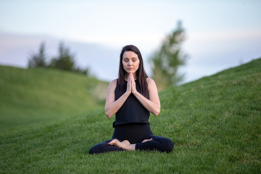 woman doing yoga outdoors