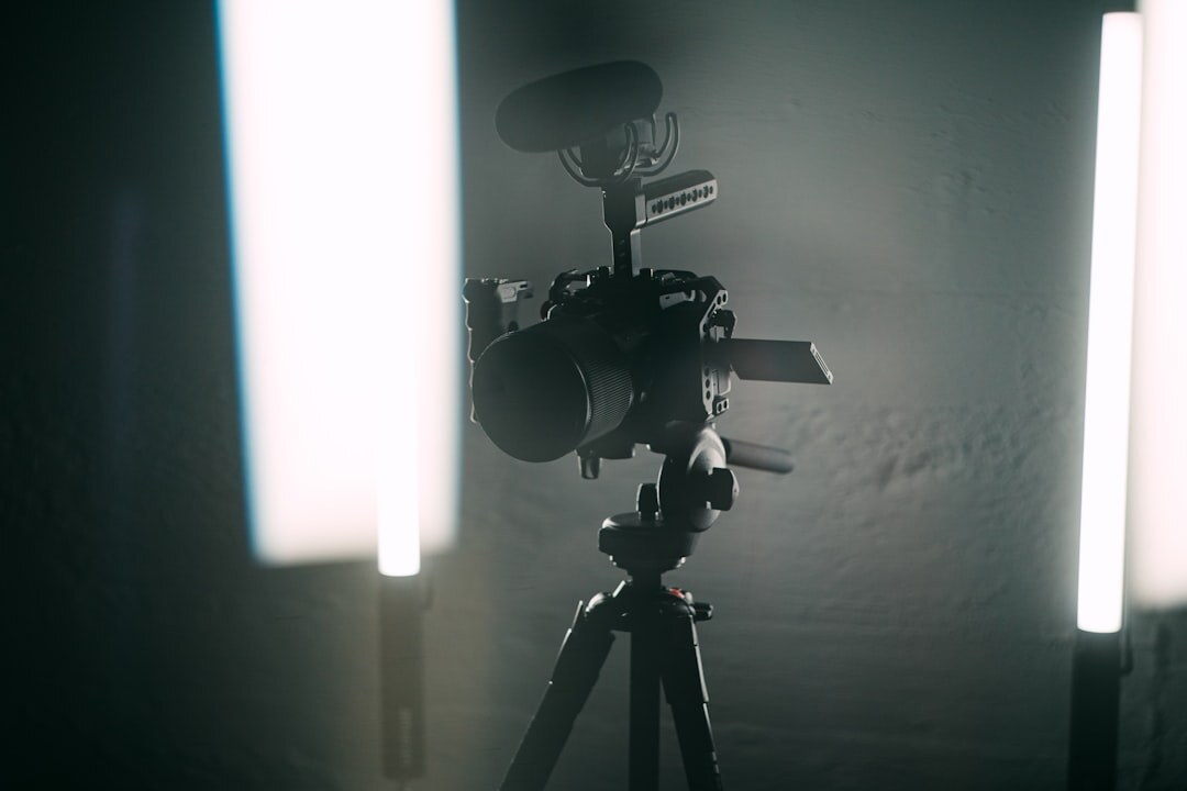 Television studio set with cameras and bright lighting