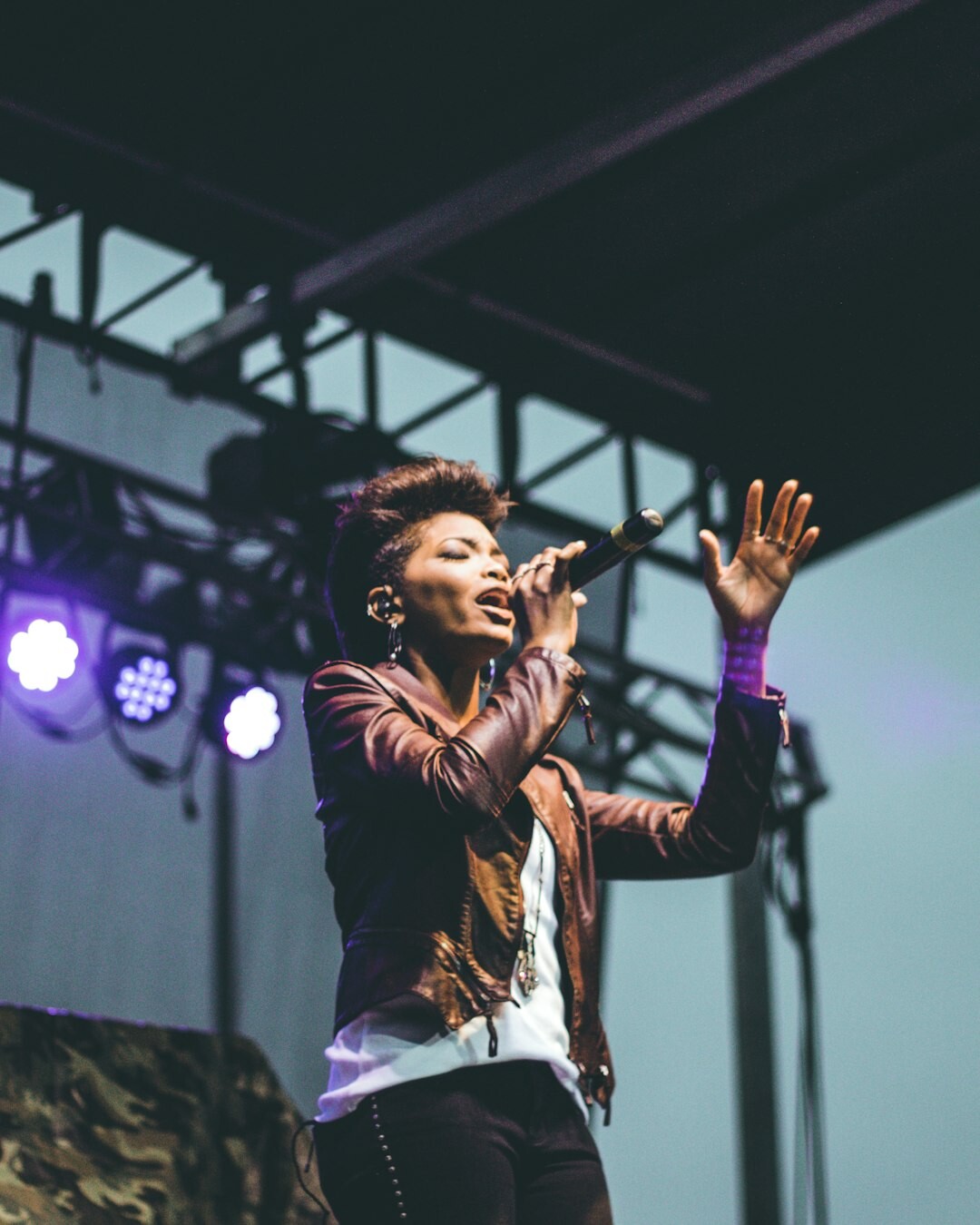 singer performing on stage